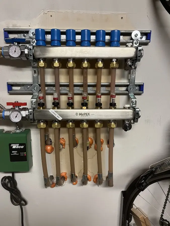 Plumber performing Gas Line Installation at a residential property in Edgemere